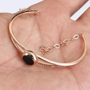 Black onyx rosegold & topaz bracelet